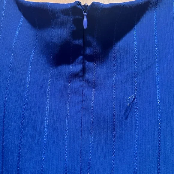 DKNY Blue “fake” wrap w/ belt.
handkerchief hem/midi length - Picture 5 of 5